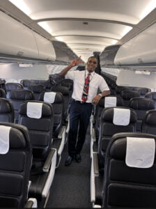 A picture of Carlos on his first flight to Amsterdam, operating as a British Airways Cabin Crew Operator.